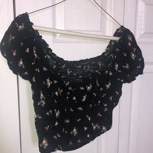 Women’s stretchy, off-shoulder, floral crop top.